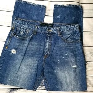 ROCAWEAR ALL OVER PAINTED DISTRESSED JEANS W40
